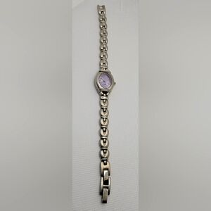 Ladies Petite Oval Silver Tone Case Lilac Dial Link Bracelet Watch
